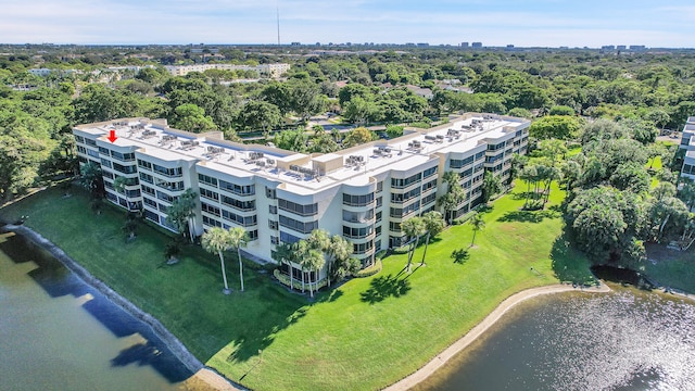 birds eye view of property featuring a water view