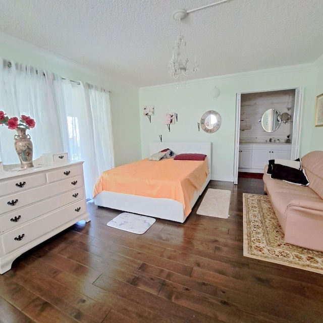 bedroom with a textured ceiling, dark hardwood / wood-style floors, and crown molding