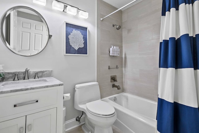 full bathroom with shower / bath combination with curtain, vanity, and toilet