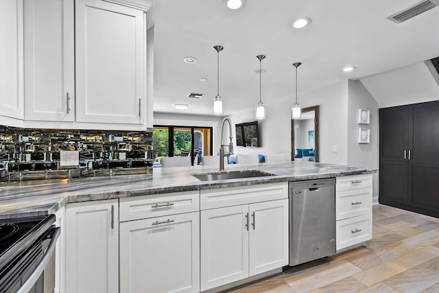 kitchen featuring white cabinets, sink, stainless steel appliances, and hanging light fixtures