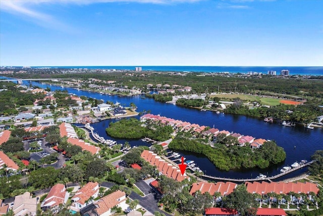 birds eye view of property featuring a water view