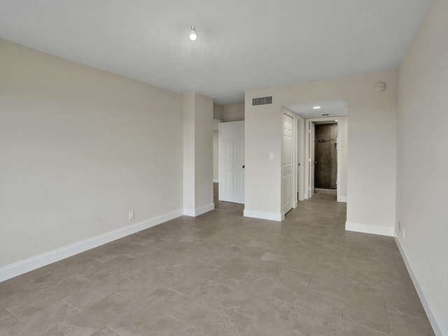 view of tiled spare room