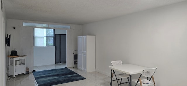 interior space featuring a textured ceiling