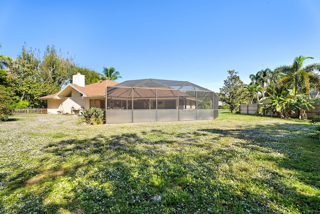 view of yard featuring a lanai