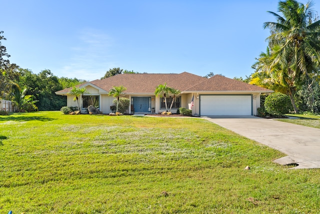 ranch-style home featuring a front yard and a garage