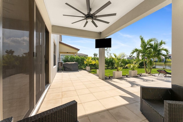 view of patio / terrace featuring ceiling fan