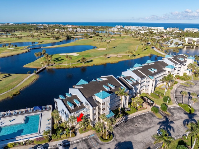 bird's eye view with a water view