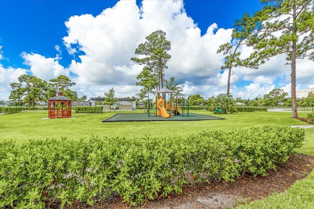 view of play area with a yard