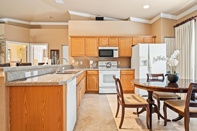 kitchen featuring lofted ceiling, sink, white appliances, and ornamental molding