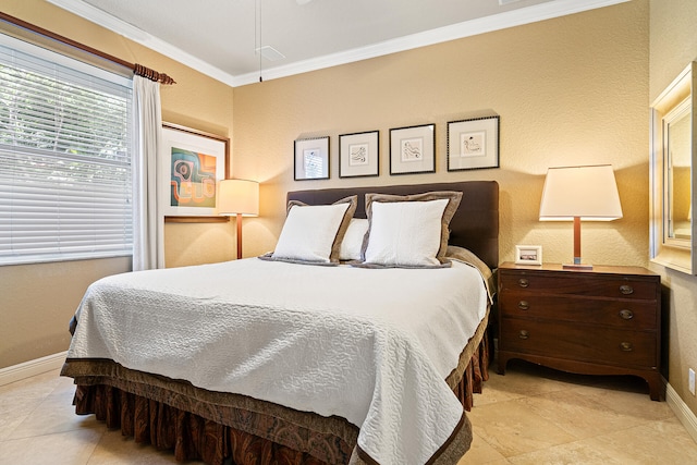 bedroom featuring crown molding