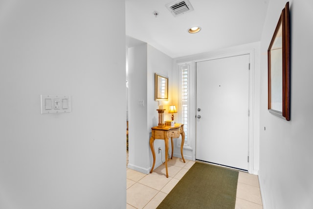 view of tiled foyer entrance