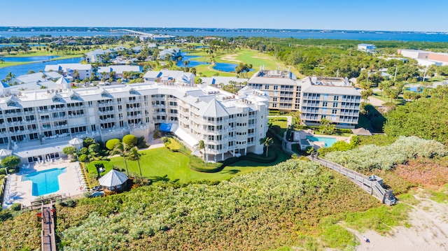 drone / aerial view with a water view