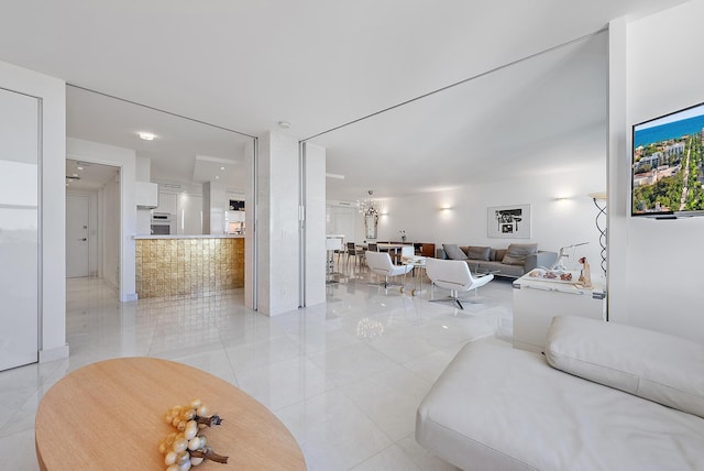 living room with light tile patterned floors