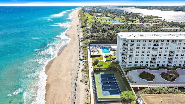 aerial view featuring a water view and a beach view