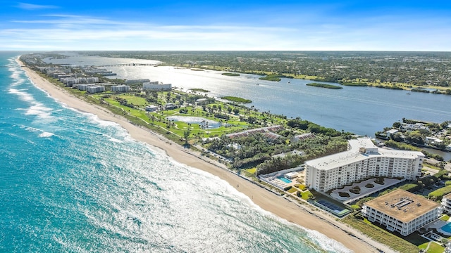 bird's eye view featuring a beach view and a water view