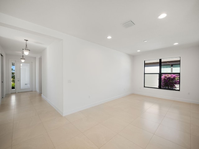 view of tiled spare room