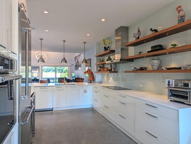 kitchen featuring white cabinetry, hanging light fixtures, black electric stovetop, island range hood, and decorative backsplash