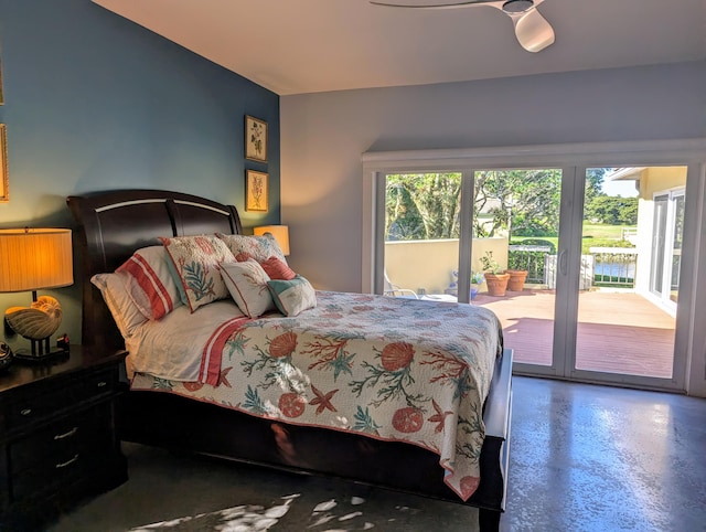 bedroom with access to exterior, concrete floors, and ceiling fan