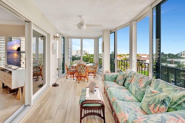 sunroom / solarium with ceiling fan