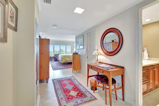 hall with light tile patterned flooring