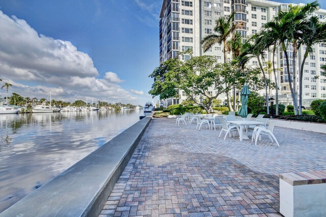 view of patio with a water view