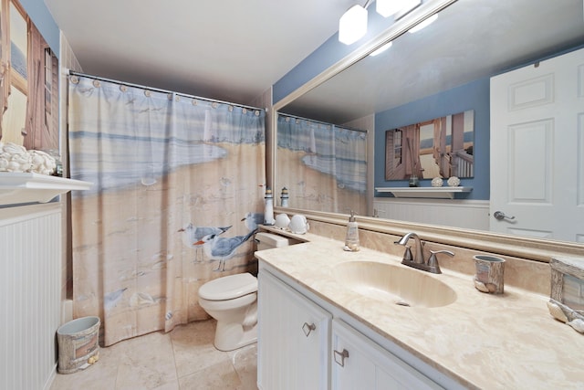 full bathroom featuring vanity, shower / bath combination with curtain, and toilet