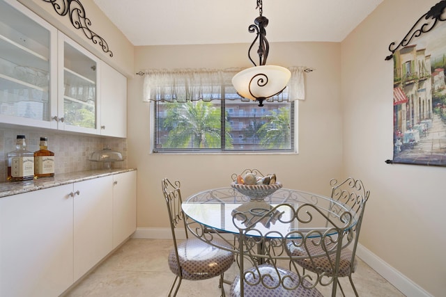 dining room featuring light tile patterned floors