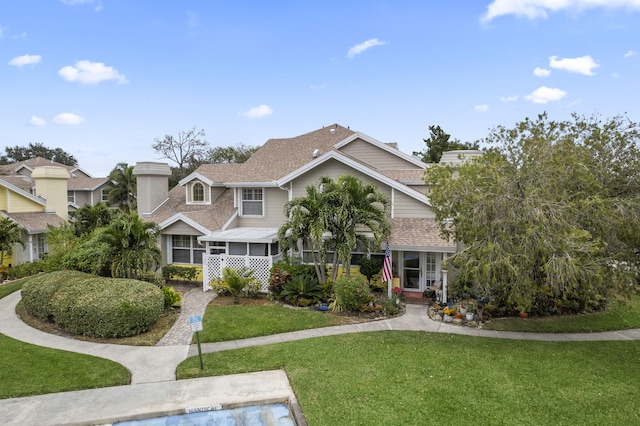 view of front of property with a front yard