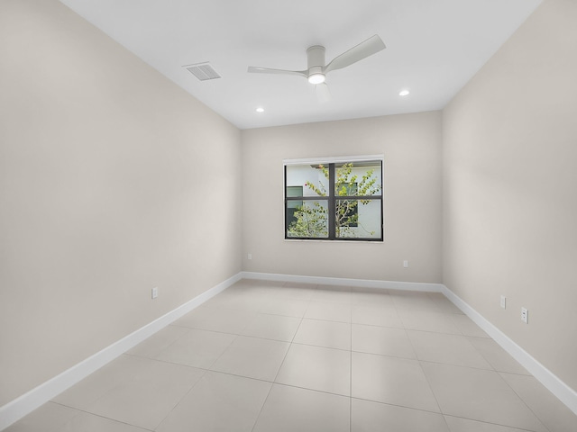 11282 SW Sea Cove Ln, Port Saint Lucie, FL 34987 - unfurnished room with a ceiling fan, baseboards, recessed lighting, and light tile patterned flooring