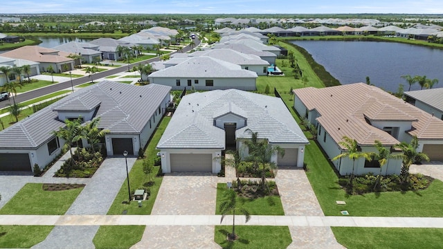 11282 SW Sea Cove Ln, Port Saint Lucie, FL 34987 - aerial perspective of suburban area with a nearby body of water