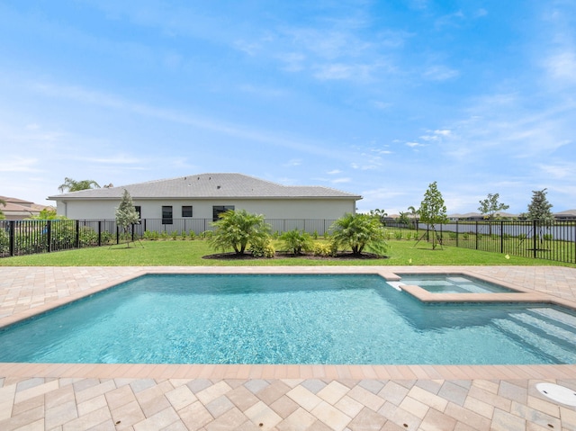 11282 SW Sea Cove Ln, Port Saint Lucie, FL 34987 - view of pool featuring a pool with connected hot tub and a patio area