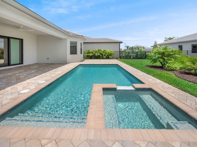 11282 SW Sea Cove Ln, Port Saint Lucie, FL 34987 - view of pool featuring a pool with connected hot tub and a patio