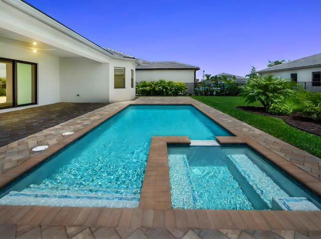 11282 SW Sea Cove Ln, Port Saint Lucie, FL 34987 - view of pool featuring a pool with connected hot tub and a patio