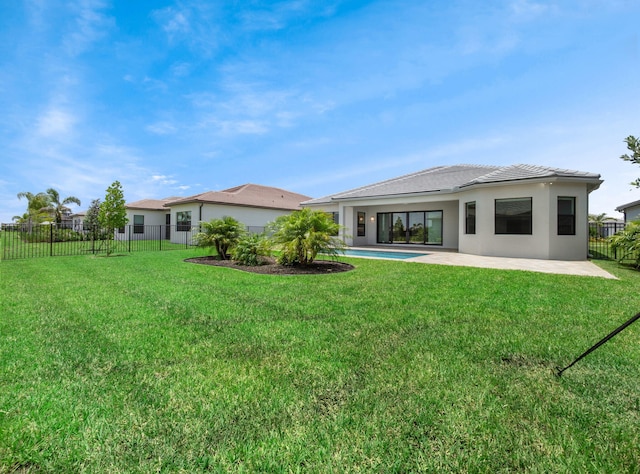 11282 SW Sea Cove Ln, Port Saint Lucie, FL 34987 - back of property with a patio area and stucco siding