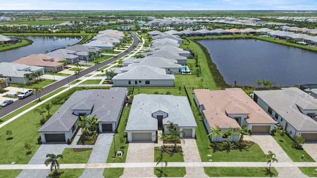 11282 SW Sea Cove Ln, Port Saint Lucie, FL 34987 - aerial perspective of suburban area featuring a nearby body of water