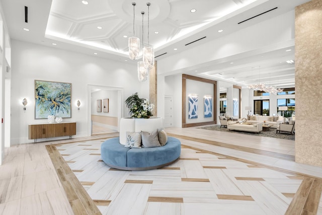 11282 SW Sea Cove Ln, Port Saint Lucie, FL 34987 - building lobby featuring a towering ceiling, recessed lighting, and coffered ceiling