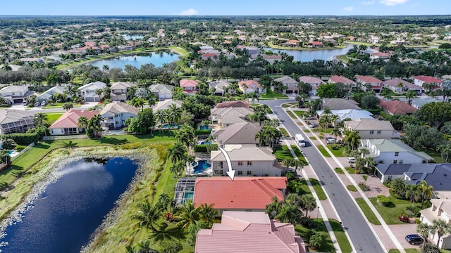 drone / aerial view featuring a water view