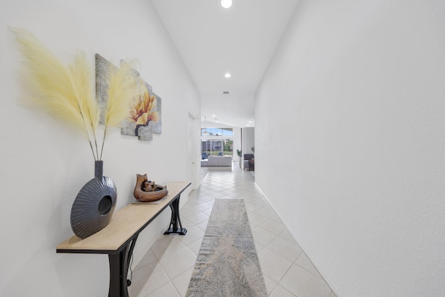 hall with light tile patterned flooring