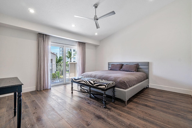 bedroom with a textured ceiling, access to outside, ceiling fan, dark wood-type flooring, and lofted ceiling