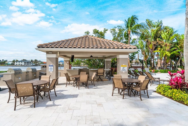 view of patio / terrace with a gazebo, grilling area, and ceiling fan