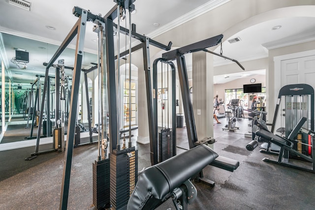 workout area with ornamental molding