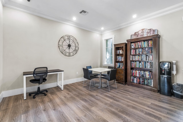 office featuring wood-type flooring and ornamental molding