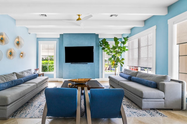 tiled living room featuring beam ceiling and ceiling fan