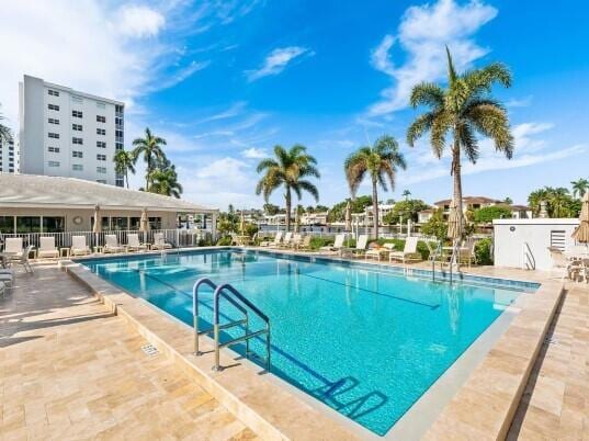 view of pool featuring a patio