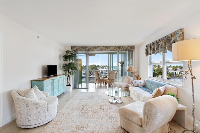 tiled living room featuring plenty of natural light