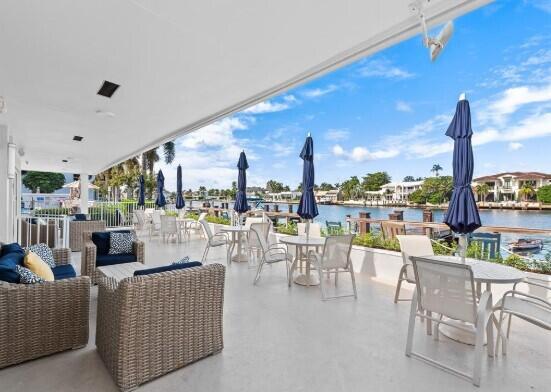 view of patio / terrace featuring an outdoor hangout area and a water view