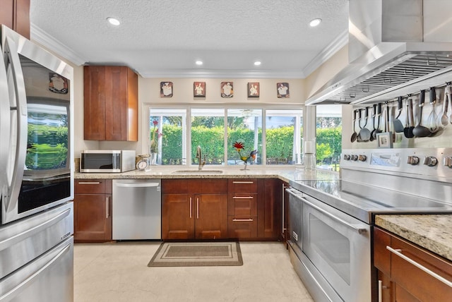 kitchen with a textured ceiling, sink, stainless steel appliances, and extractor fan