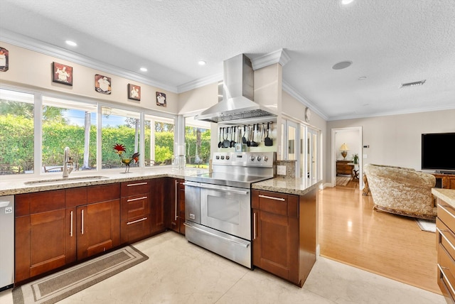 kitchen featuring a textured ceiling, ventilation hood, stainless steel appliances, and sink