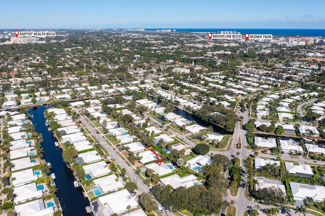 drone / aerial view featuring a water view