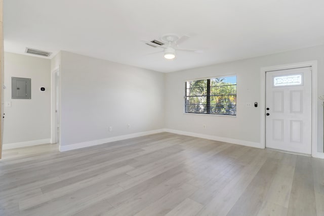 entryway featuring electric panel, ceiling fan, and light wood-type flooring